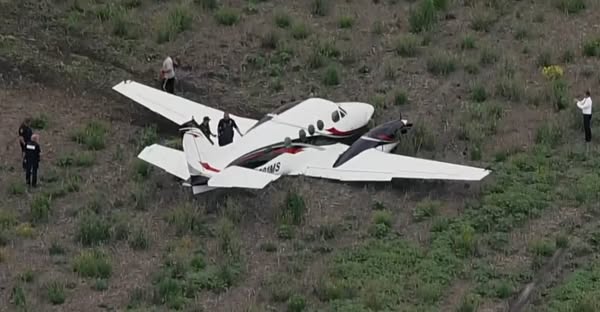 A Plane, Struggling to Stay Airborne, Crashes Into a Parking Lot: A Story of Survival, Tragedy, and Luck
